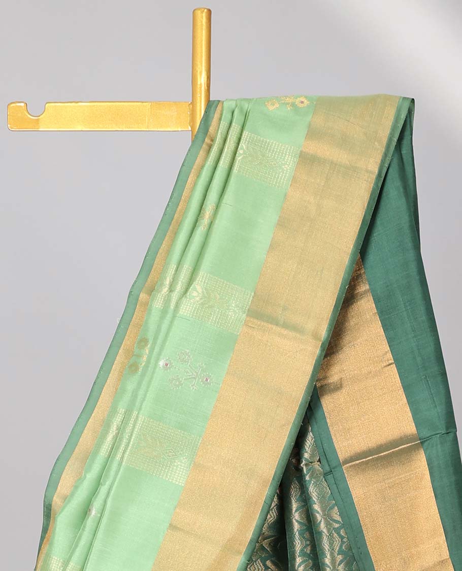Green uppada silk saree with zari designs, contrast plain border & pallu of intricate designs