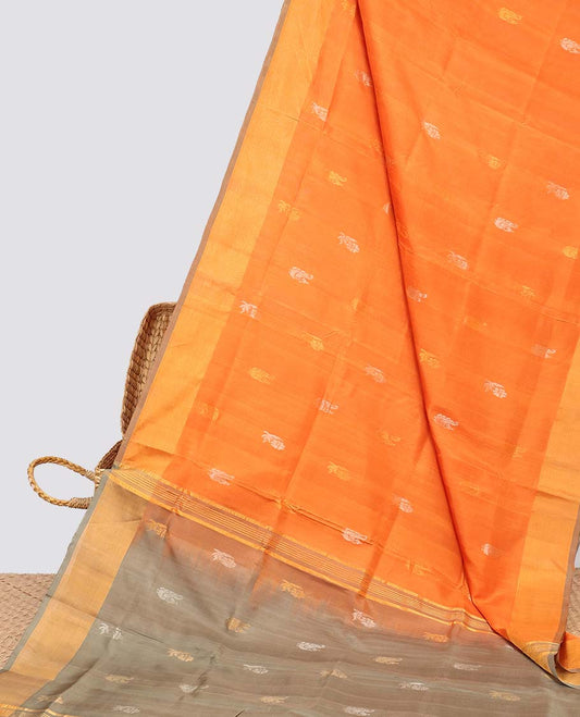 Orange uppada silk saree with floral buttas, contrast plain border & pallu of zari designs