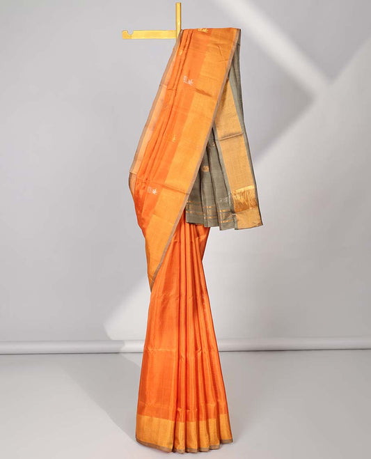 Orange uppada silk saree with floral buttas, contrast plain border & pallu of zari designs