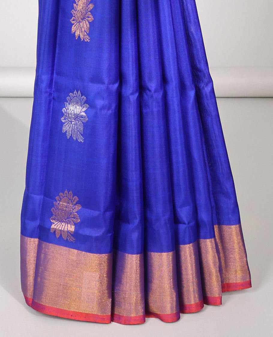 Blue uppada silk saree with buttas, contrast plain border & pallu of floral designs