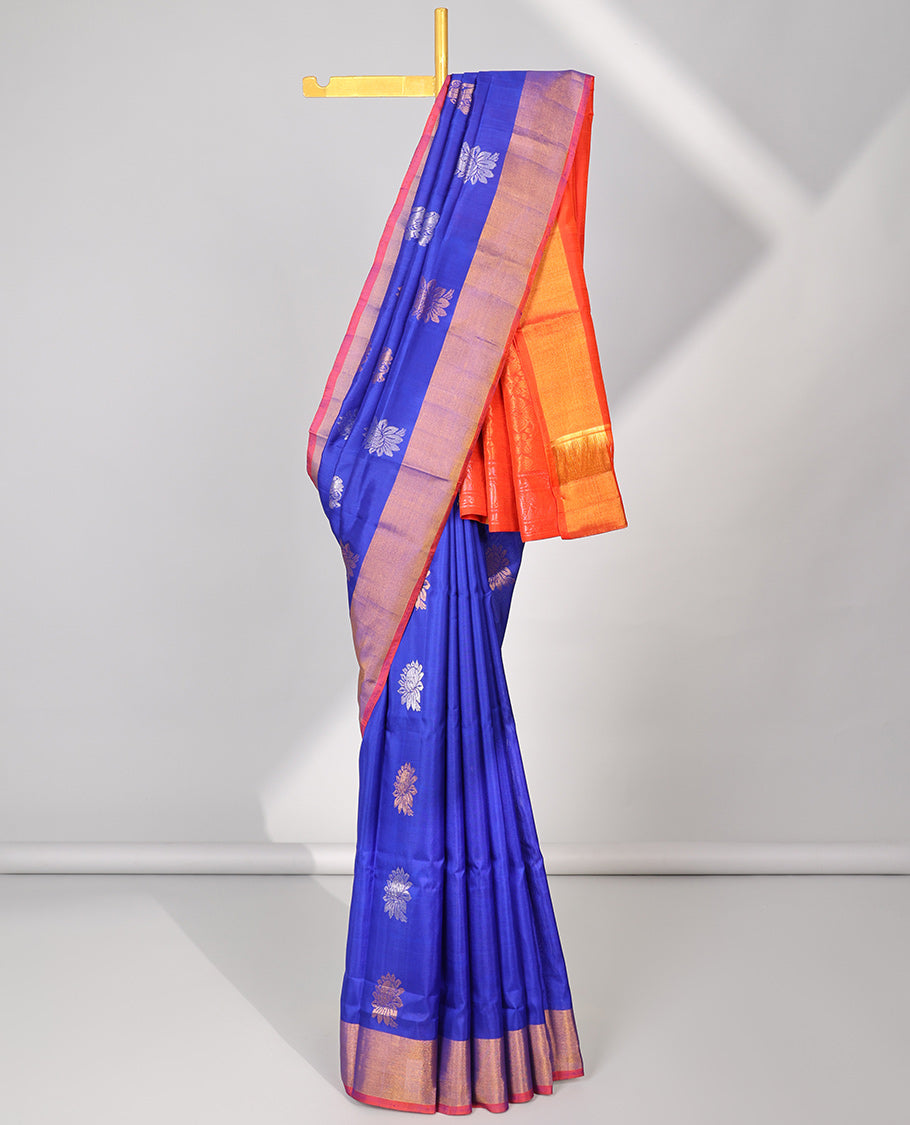 Blue uppada silk saree with buttas, contrast plain border & pallu of floral designs
