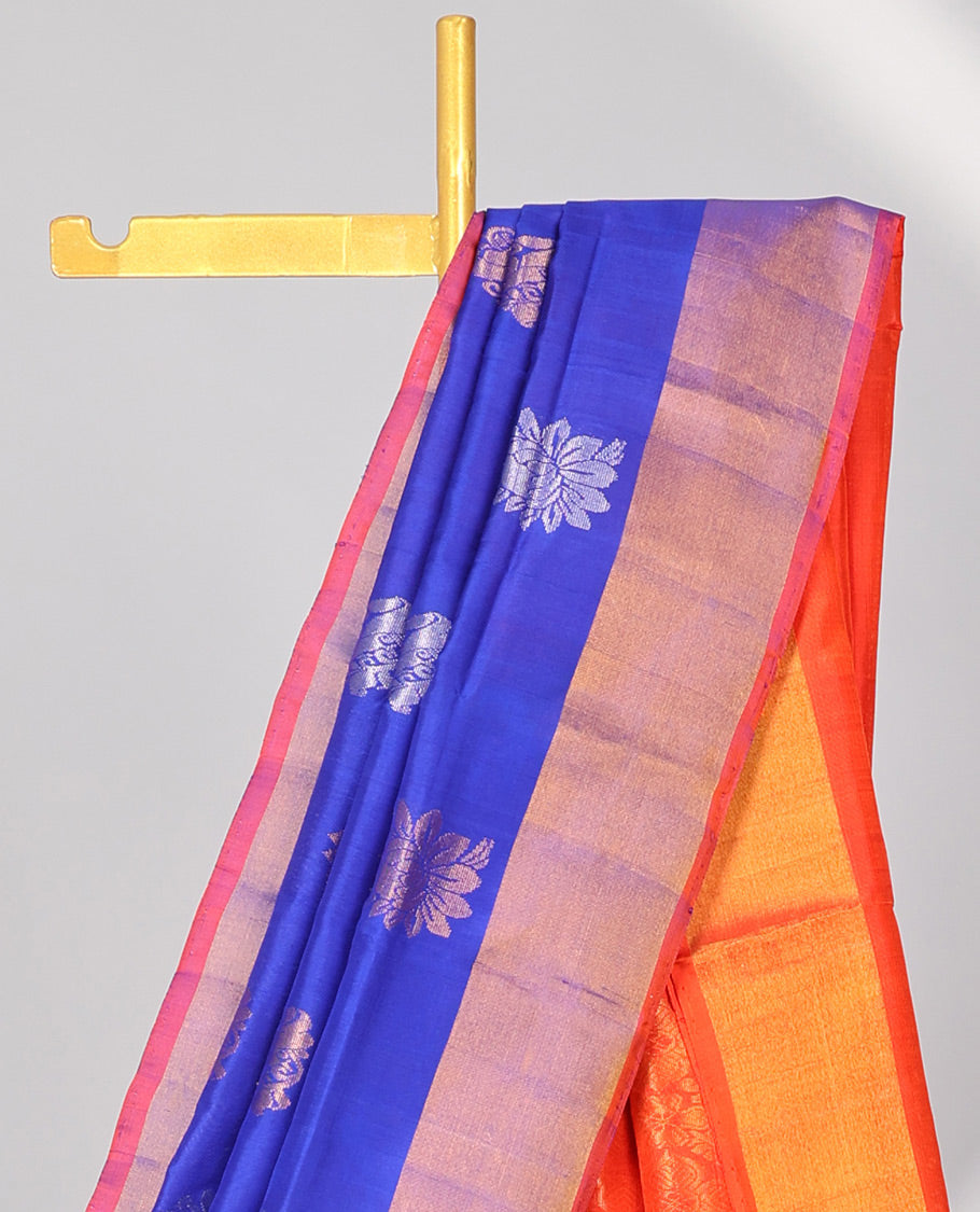 Blue uppada silk saree with buttas, contrast plain border & pallu of floral designs