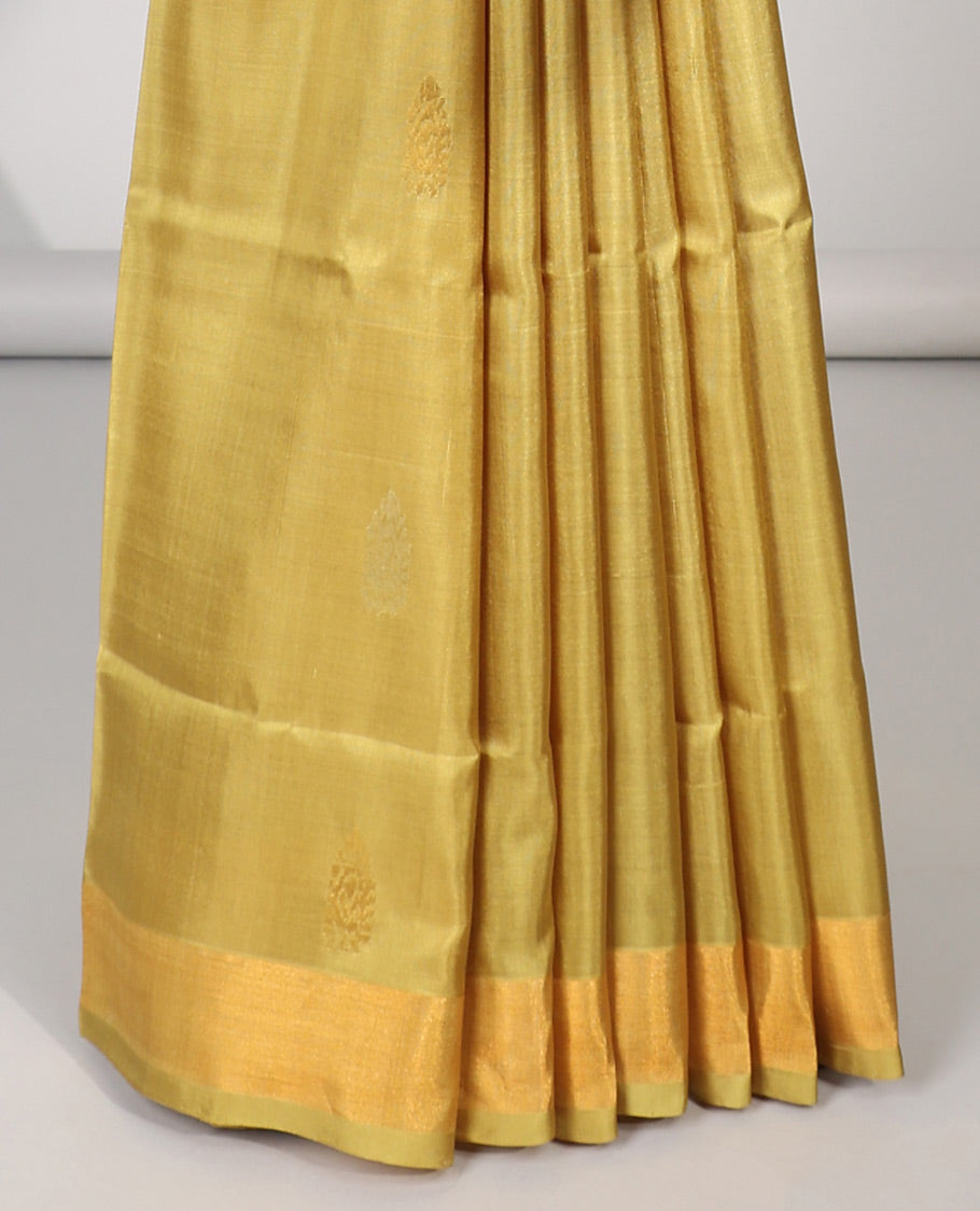 Green uppada silk saree with buttas, plain border & pallu of zari buttas