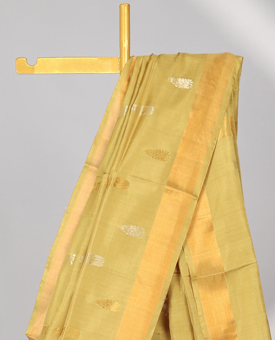 Green uppada silk saree with buttas, plain border & pallu of zari buttas