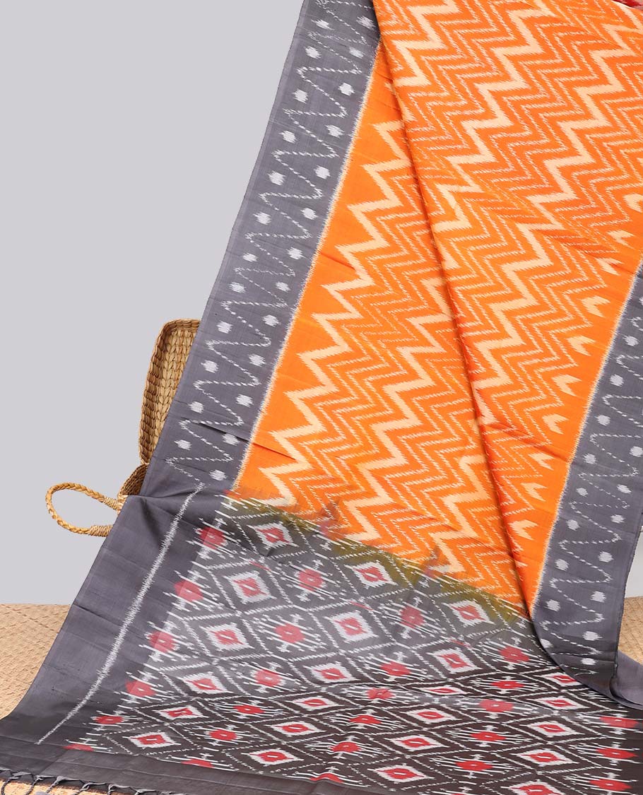 Orange ikkat-style chevron striped soft silk saree, contrast border & pallu of ikkat designs