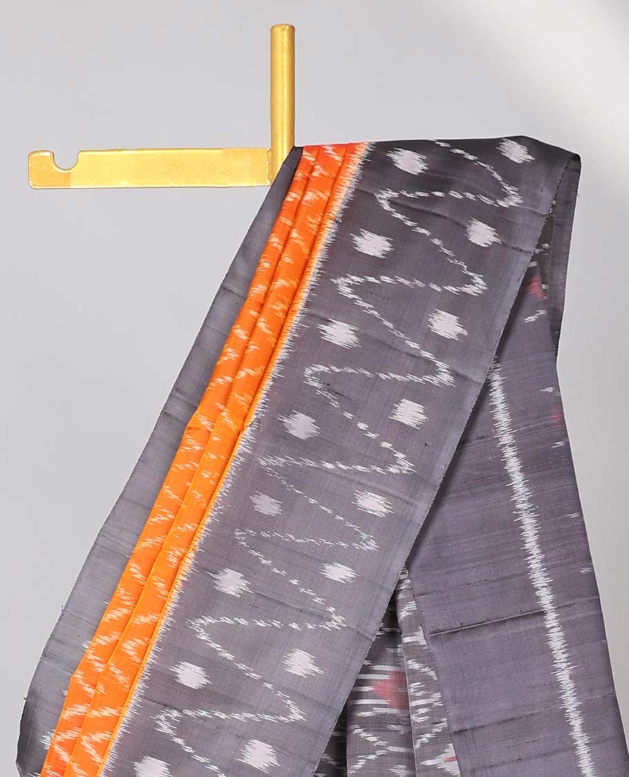 Orange ikkat-style chevron striped soft silk saree, contrast border & pallu of ikkat designs