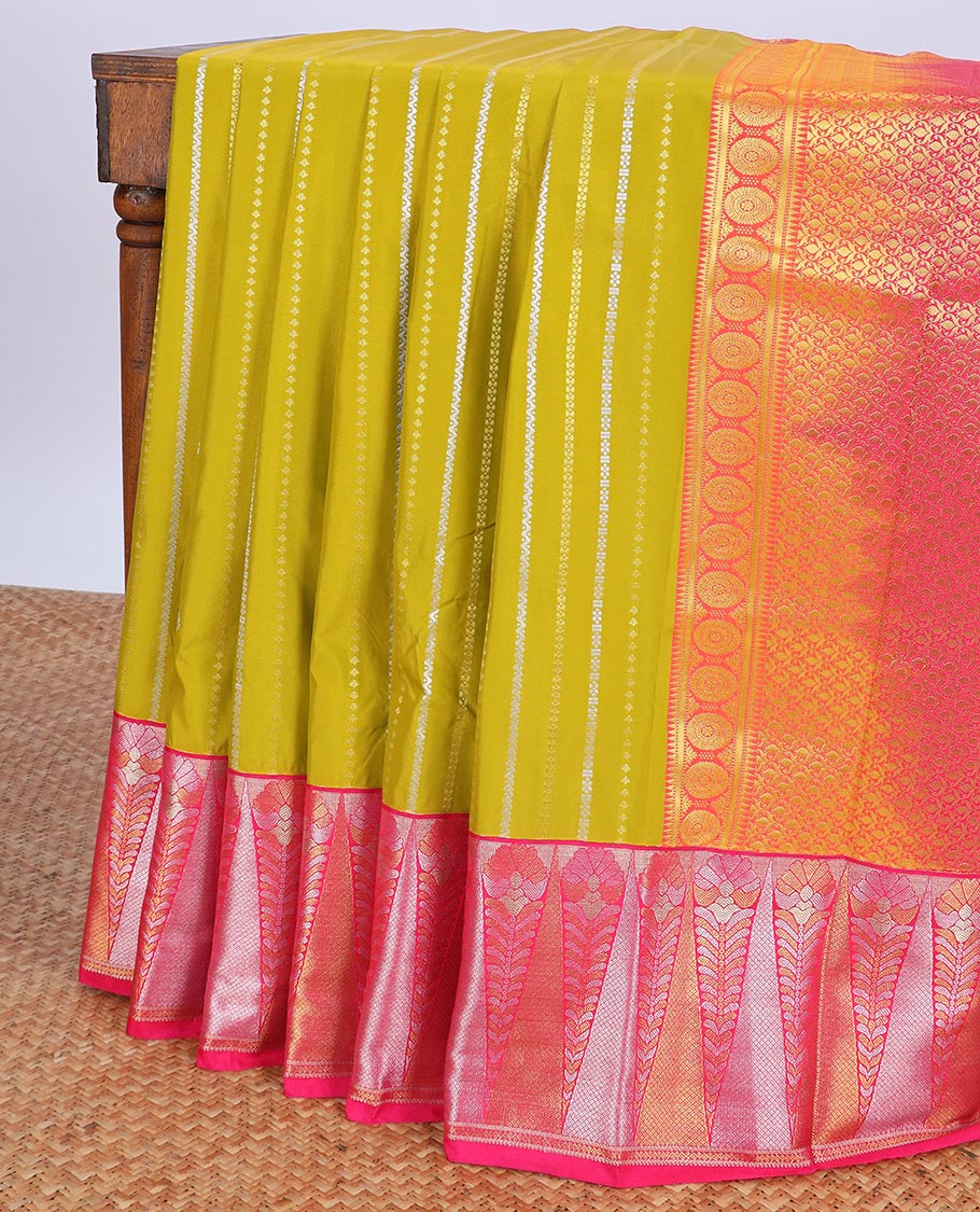 Green budget silk saree with zari designs, contrast floral design zari border & intricate pallu