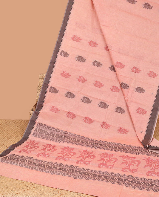 Peach kanchi cotton saree with paisley buttas, contrast temple border & pallu of floral & geometric designs