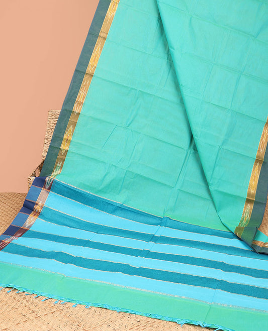 Blue plain kanchi cotton saree, contrast ikkat border & pallu of stripes
