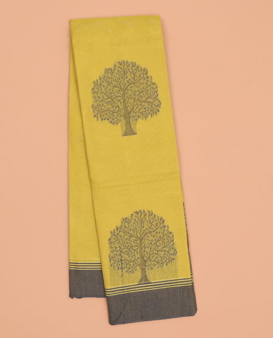 Yellow kanchi cotton saree with tree buttas, contrast plain border & pallu of floral designs