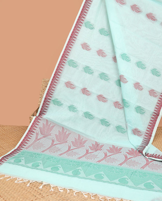 Pale blue kanchi cotton saree with buttas, temple border & floral design pallu