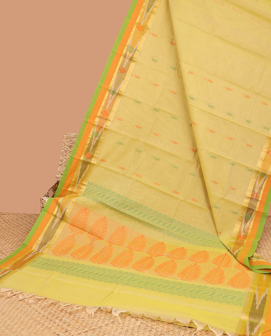 Yellow kanchi cotton saree with buttas, contrast ikkat border & floral design pallu