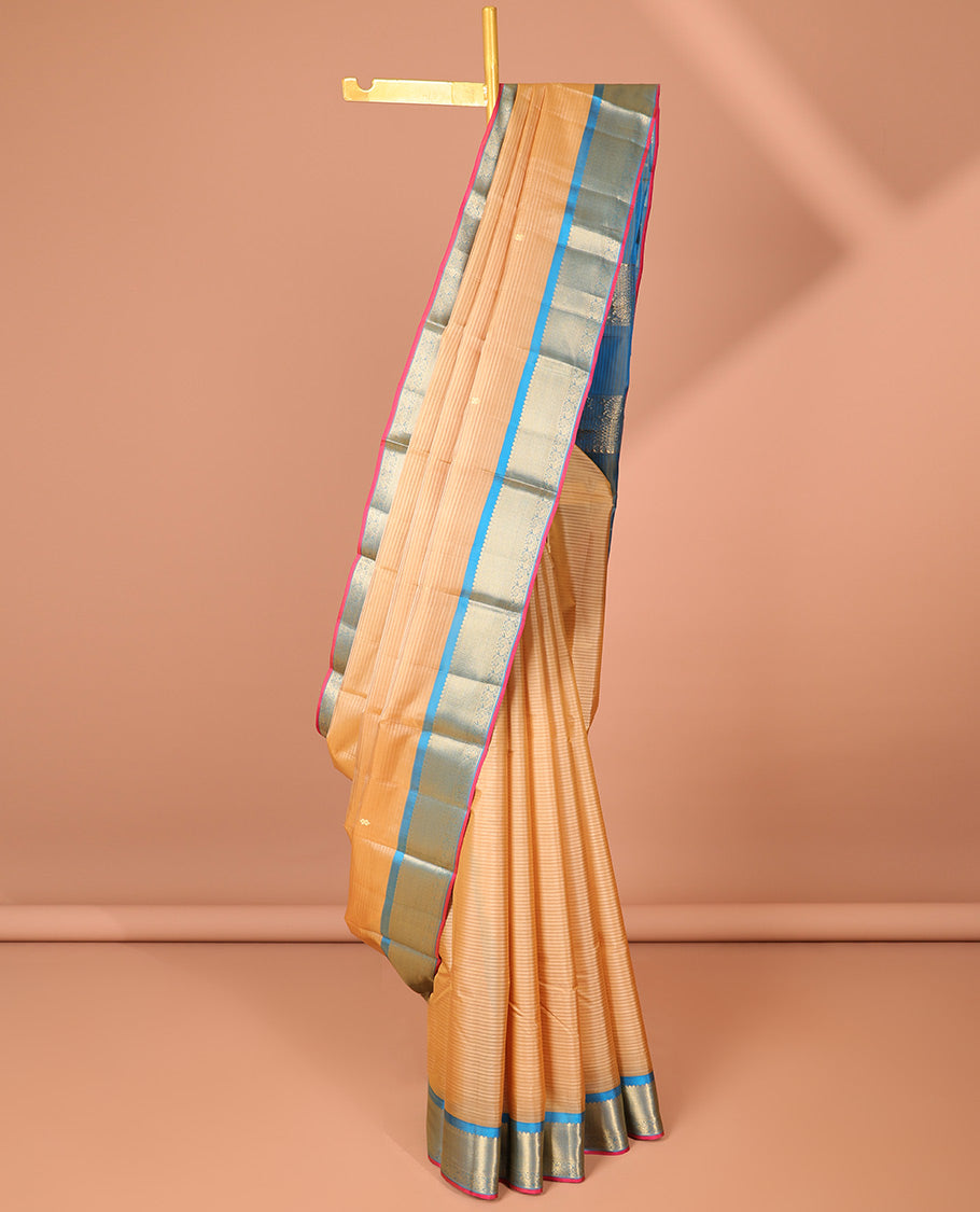 Sandal striped Kancheepuram silksaree with buttas, contrast border of thilakam mokku,vanki & mayil & zari design pallu