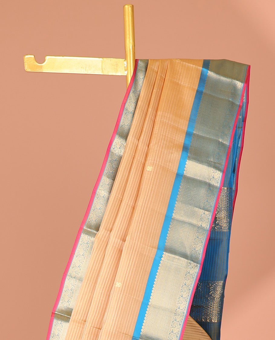 Sandal striped Kancheepuram silksaree with buttas, contrast border of thilakam mokku,vanki & mayil & zari design pallu