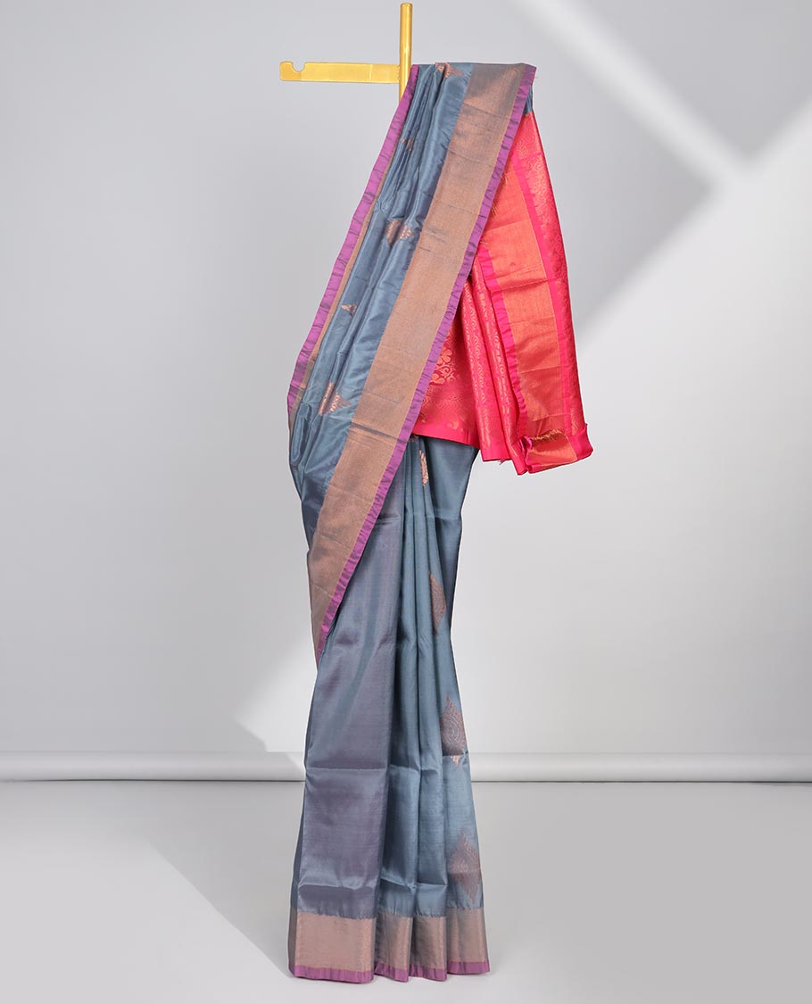 Blue zari buttas uppada saree, contrast plain border & floral design steeped pallu