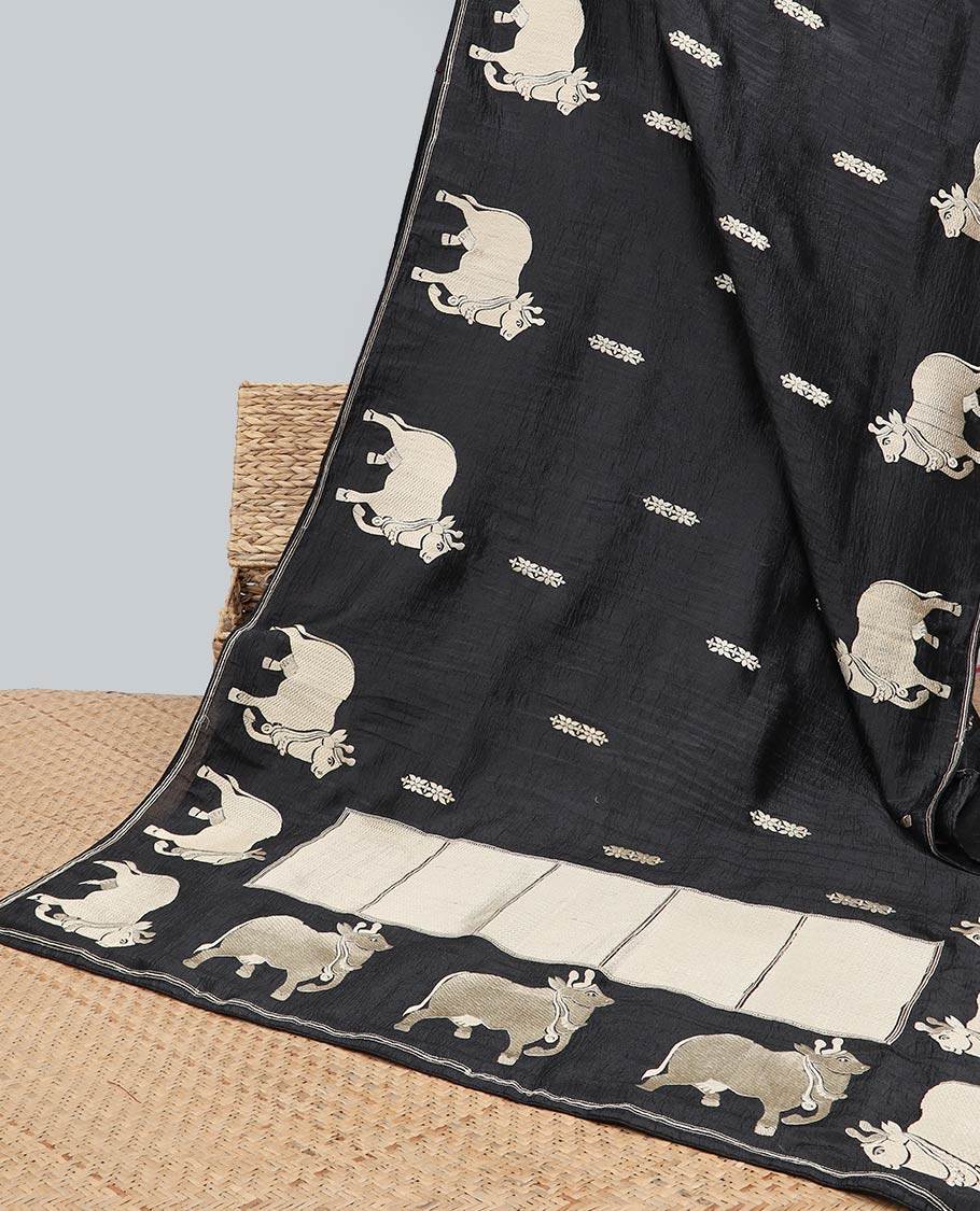 Borderless green crushed tissue saree with buttas & pichwai cow buttas, intricate pallu