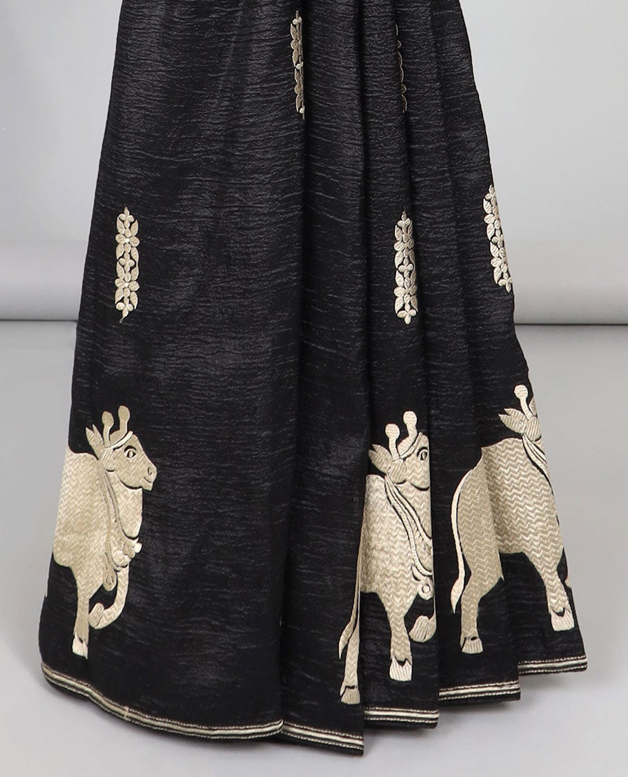 Borderless green crushed tissue saree with buttas & pichwai cow buttas, intricate pallu