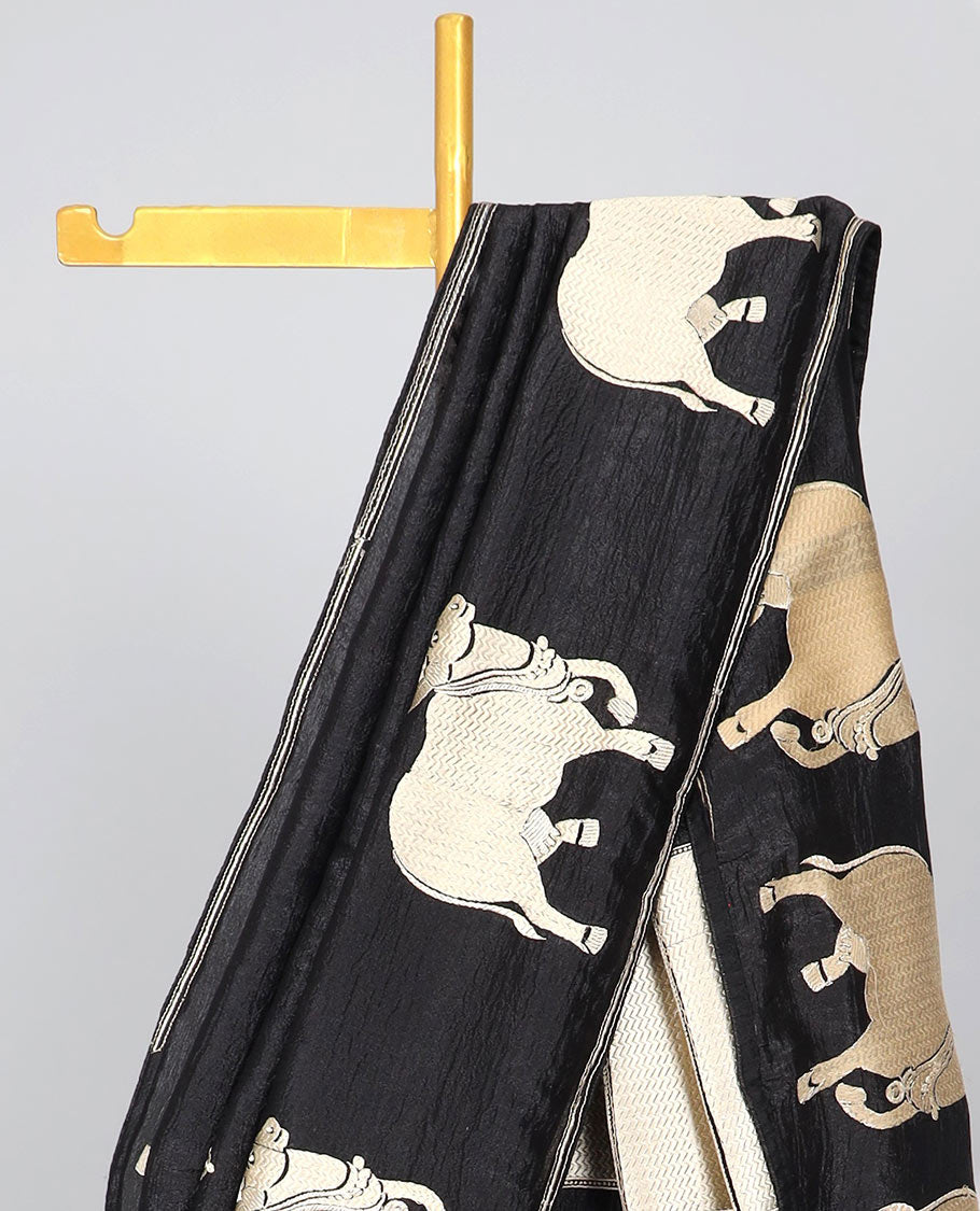 Borderless green crushed tissue saree with buttas & pichwai cow buttas, intricate pallu