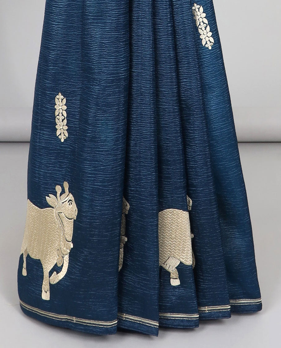 Borderless green crushed tissue saree with buttas & pichwai cow buttas, intricate pallu