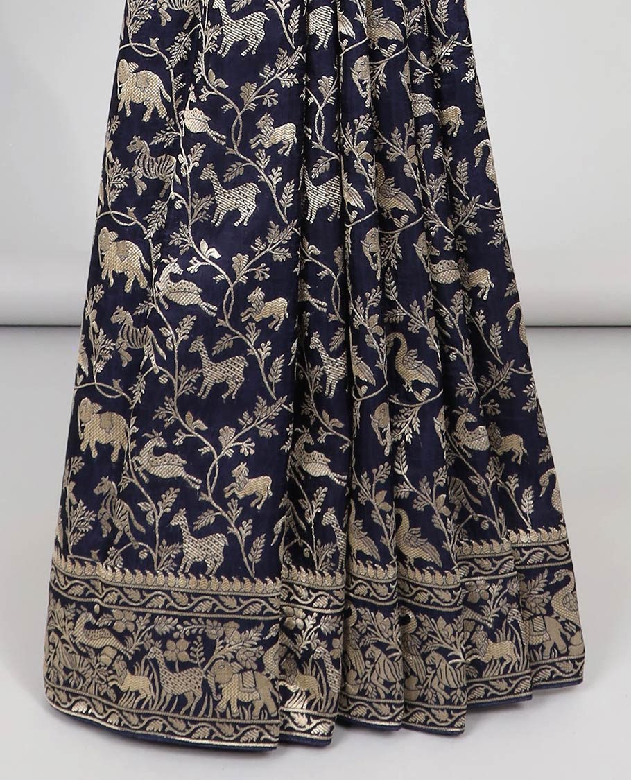 Blue floral & animal jacquard semi-banaras dola silk saree, floral & animal designs & chevron design pallu