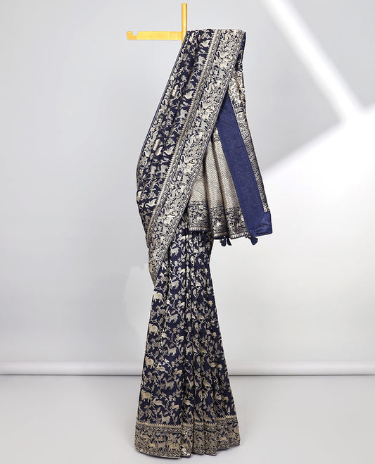 Blue floral & animal jacquard semi-banaras dola silk saree, floral & animal designs & chevron design pallu