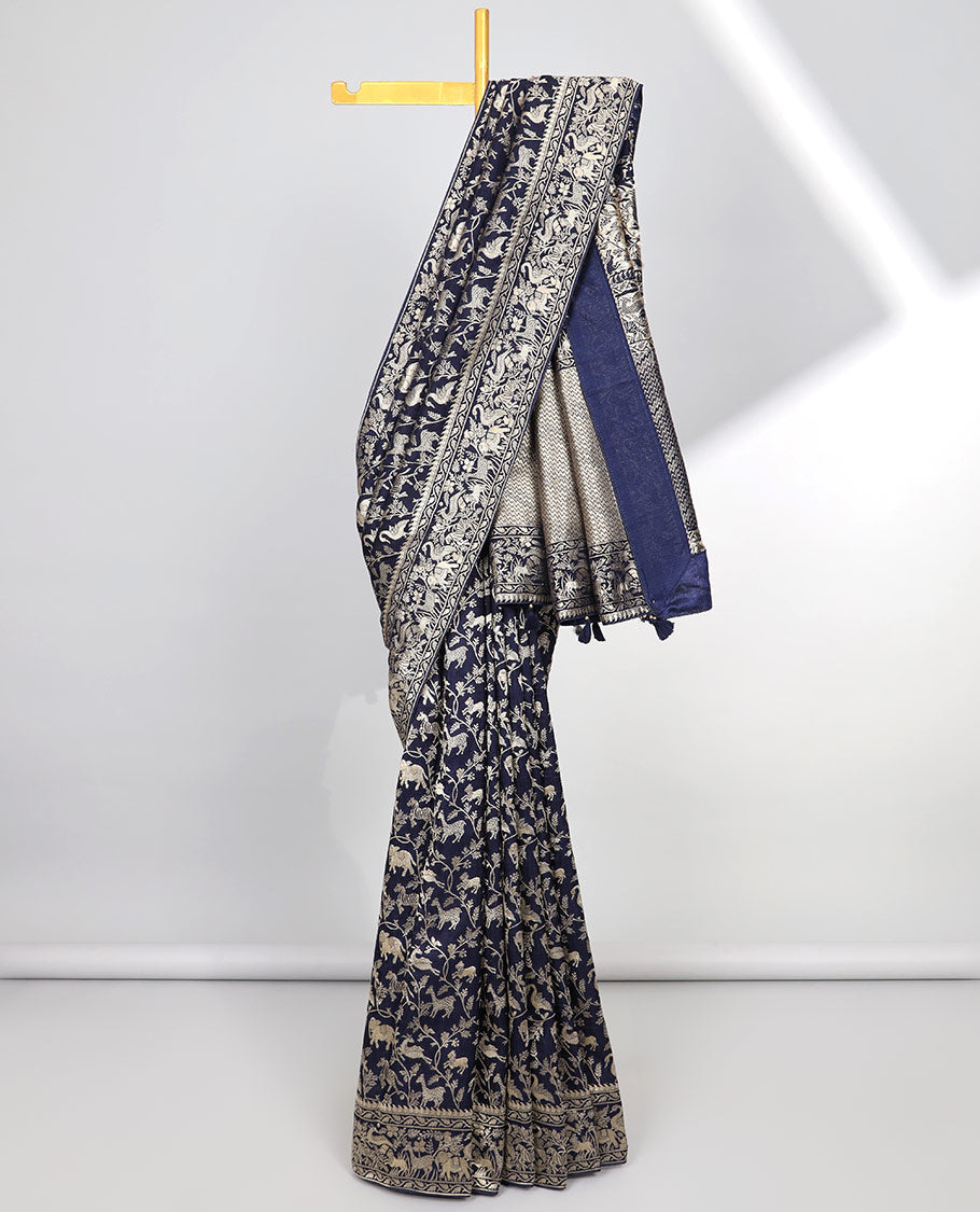 Blue floral & animal jacquard semi-banaras dola silk saree, floral & animal designs & chevron design pallu