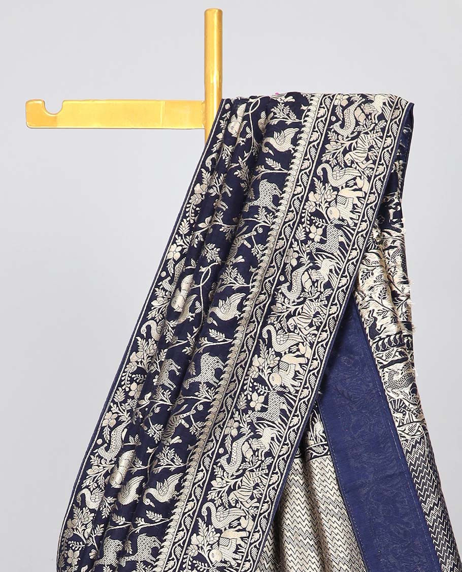 Blue floral & animal jacquard semi-banaras dola silk saree, floral & animal designs & chevron design pallu