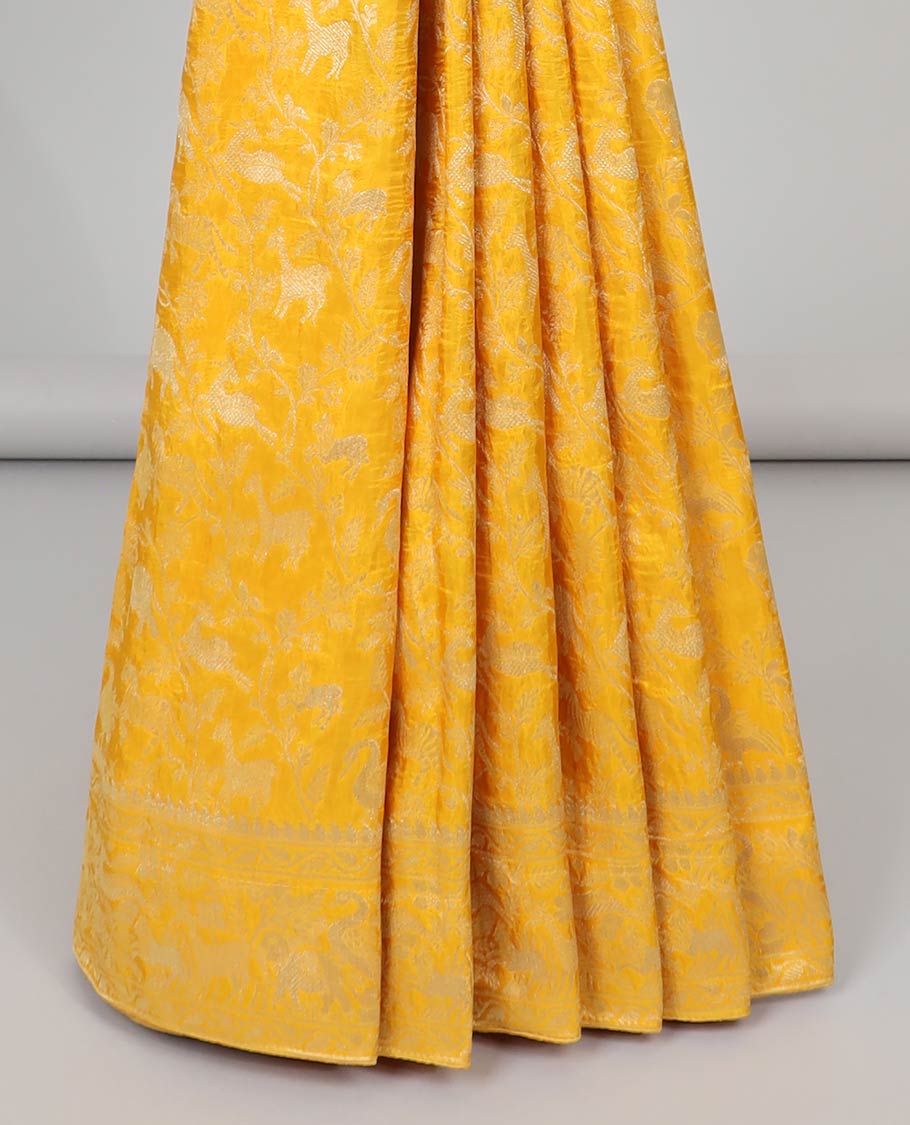 Blue floral & animal jacquard semi-banaras dola silk saree, floral & animal designs & chevron design pallu