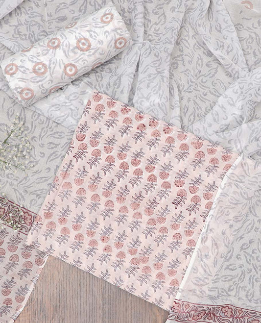 Peach material chudidhar set, floral motifs printed top, contrast bottom & dupatta of floral print