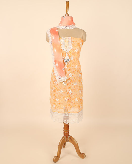 Orange material chudidhar set, print & embroidered top, plain bottom & abstract printed & embroidered dupatta