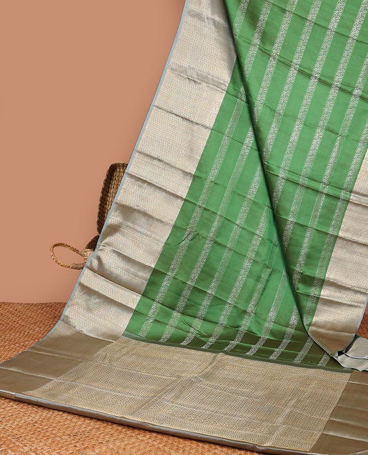 Green zari design silksaree, contrast zari border & pallu steeped with intricate designs