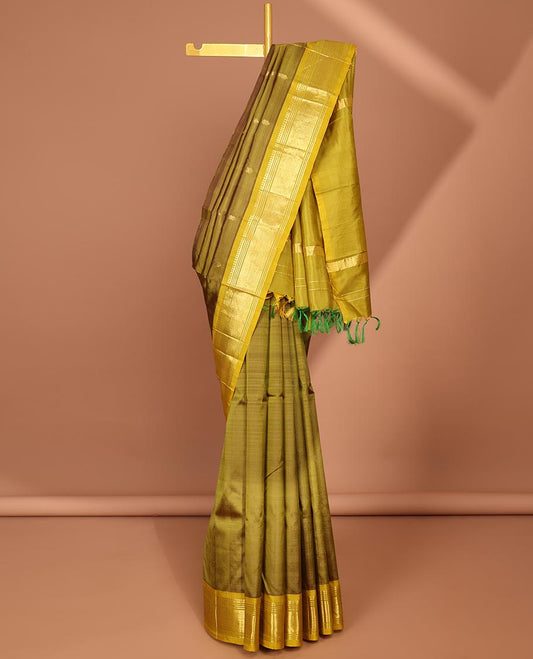 Green zari buttas Kanchipuram silk saree, contrast border of panner sombu, banaras, Muthu & mayil kann designs