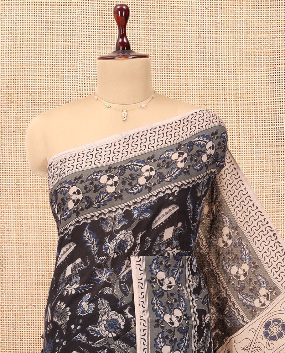 Black Kalamkari Cotton Saree, Elevated with Animal and Floral Motif Print, Complemented By Printed Border, Kalamkari Peacock Motifs Pallu, and a Matching Blouse