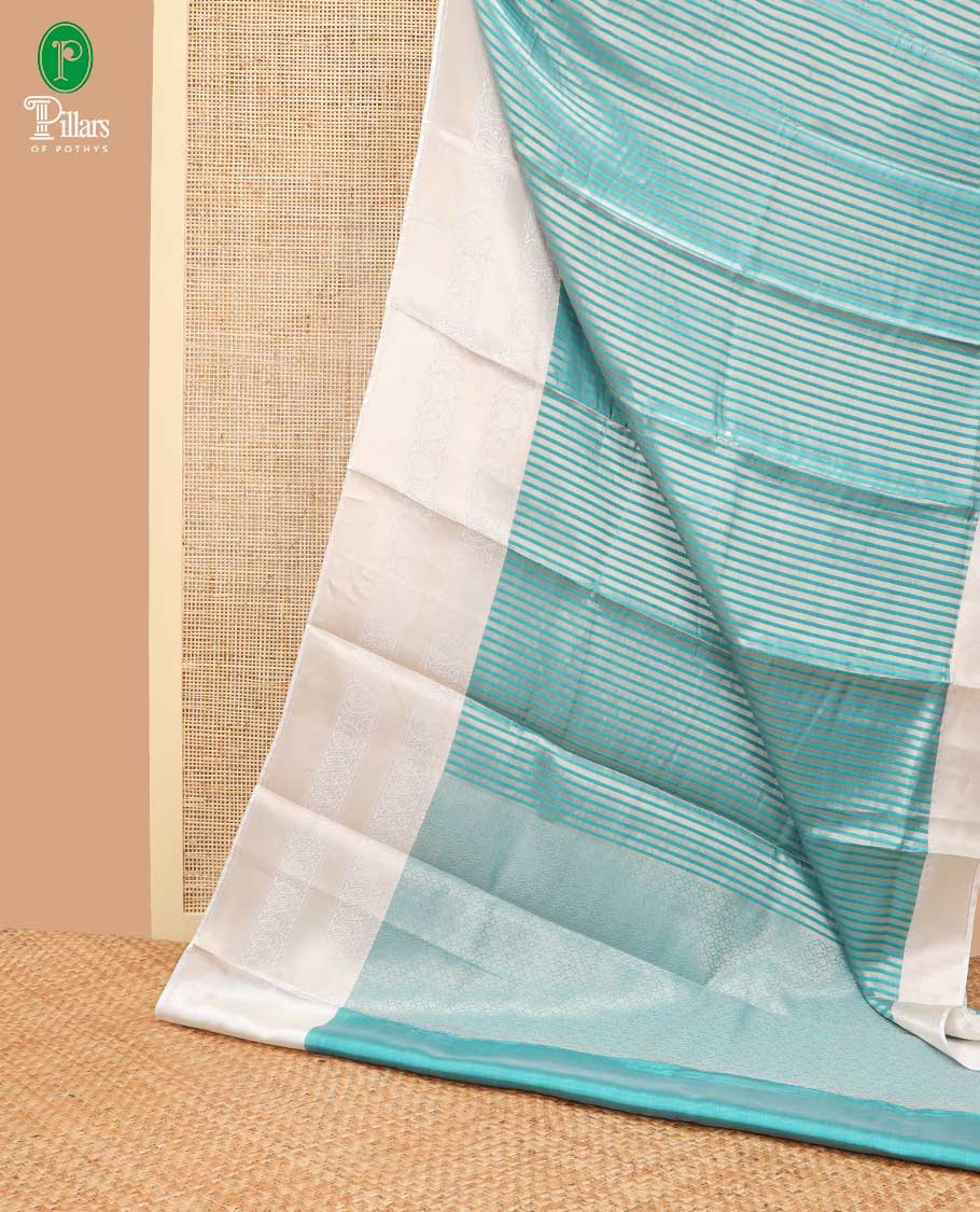 Rama green vertical design banaras kora tissue saree with contrast gold zari jacquard border weaving rich pallu along with brocade blouse