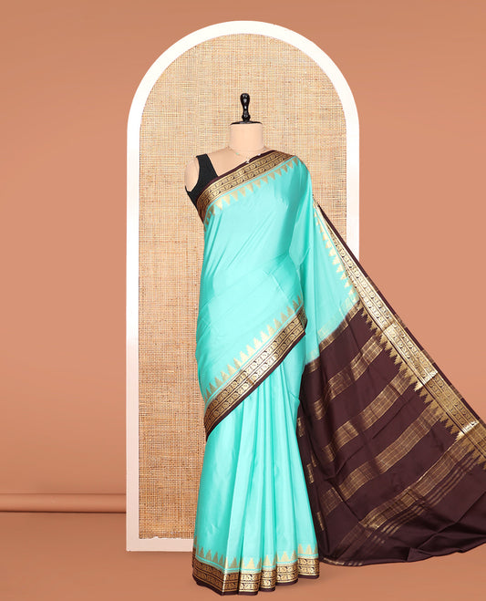 Turquoise Plain Mysore Silk Saree, Complemented by a Contrast Temple Peacock Zari Border, Zari Design Pallu, and a Contrast Blouse