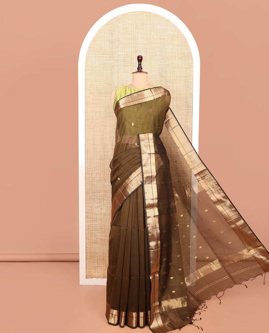 Green Maheshwari Cotton Saree, Decorated with Buttas All Over Its Body, Highlighted by a Zari Traditional Design Border, Pallu Steeped with Buttas, and Paired with a Matching Blouse