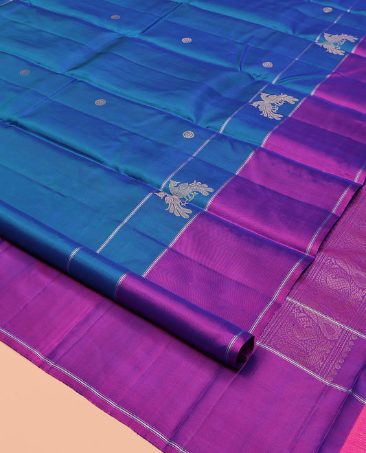 Blue Kanchipuram Silk Saree, Prettified with Chakram and Pakshi Buttas, Complemented by a Contrast Border, Iruthalai Pakshi Motif Woven Pallu, and a Contrast Blouse