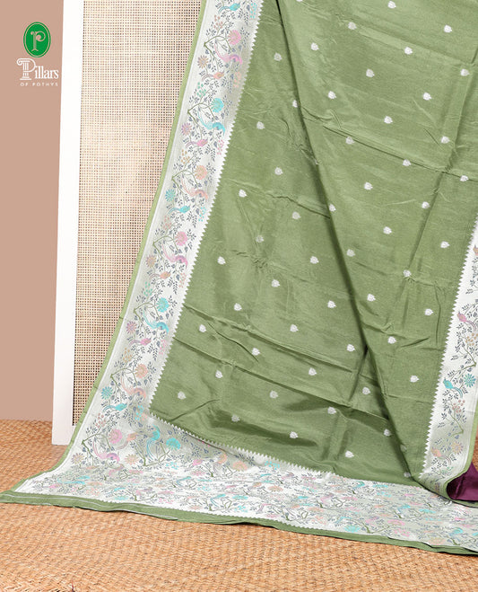 Olive green pathick style design dola silk saree with parrot design border & pathick style pallu along with contrast blouse