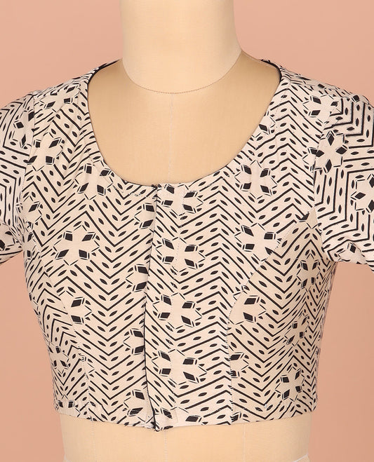 Cream Readymade Blouse Subtly Sparkled with Geometric Print, Featuring Front Round-Neck, Back Closed Neck, and Elbow Sleeves