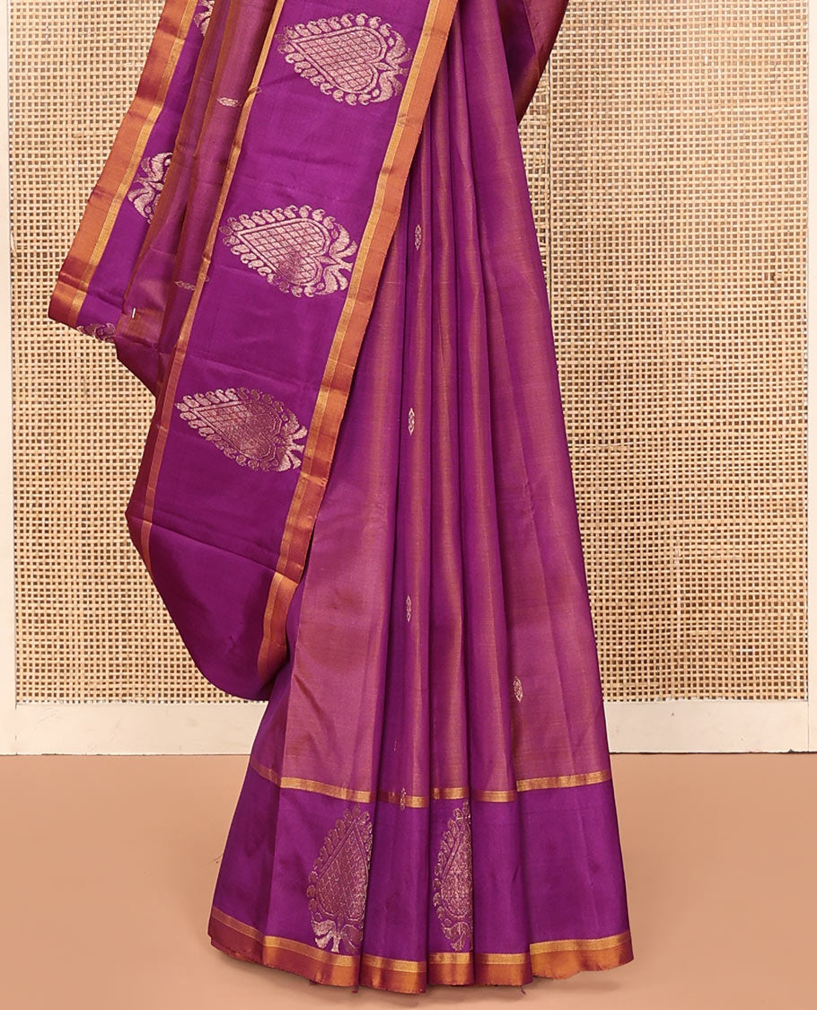 Purple Kanchipuram Silk Saree, Embellished with Zari Buttas All Over Its Body, Complemented by a Contrast Border of Zari Designs, Intricate Motifs Woven Pallu, and Paired with a Contrast Blouse