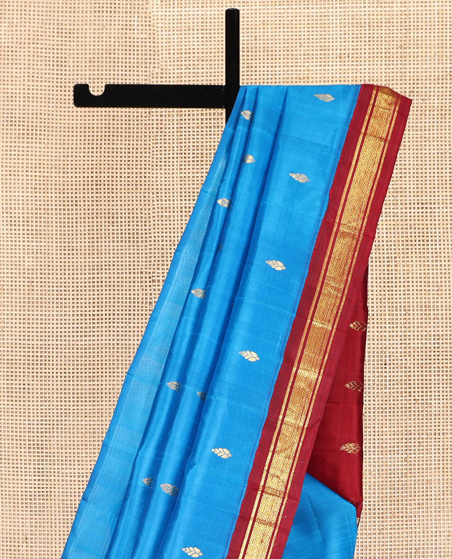 Blue Kanchipuram Silk Saree, Detailed with Zari Buttas, Complemented by a Contrast One-Sided Korvai Border of Banaras and Jaal Designs, Grand Pallu, and No Blouse