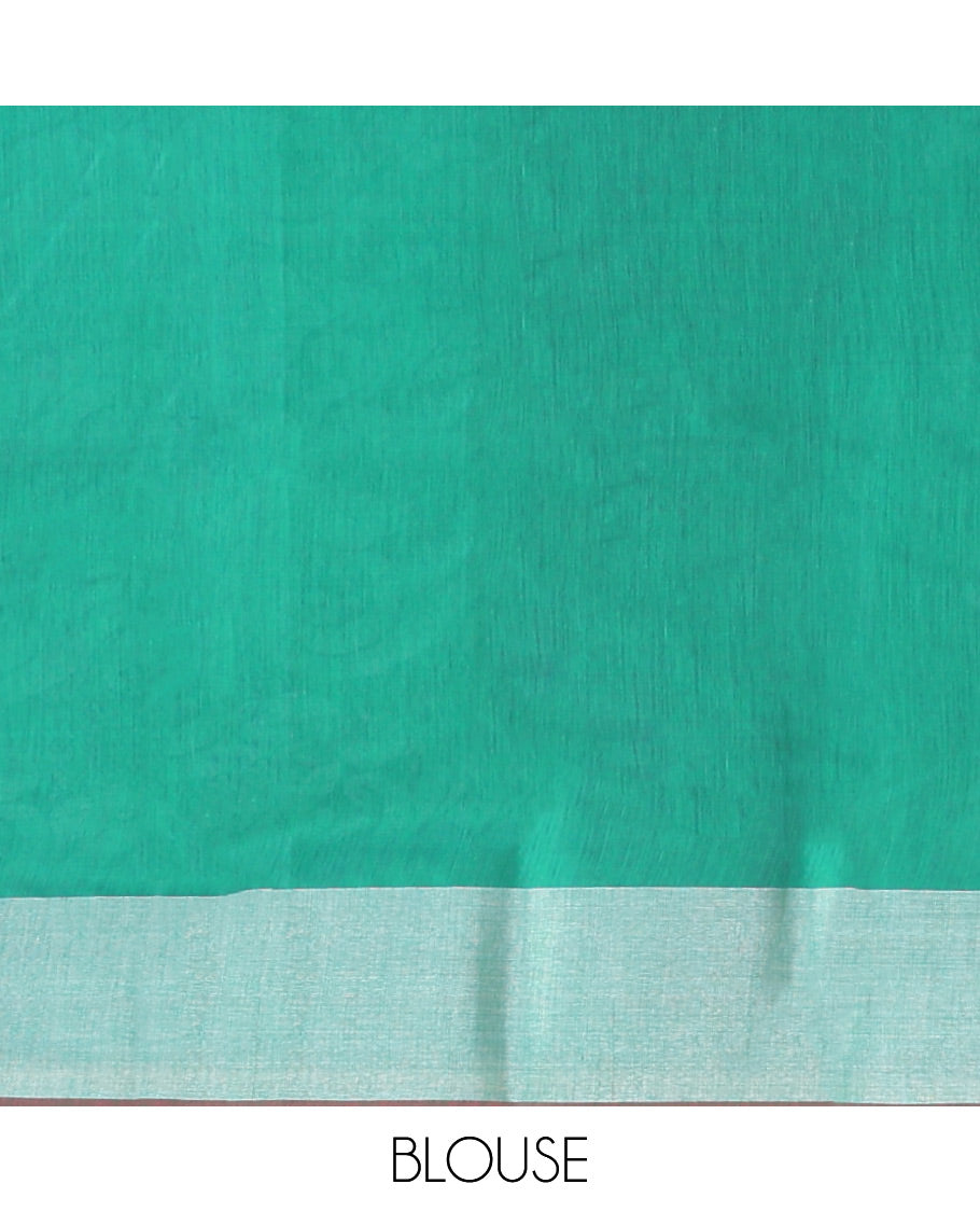 Green Semi-Silk Cotton Saree, Styled with Peacock Buttas All Over Its Body, Highlighted by a Self-Border  of Peacock Designs, Pallu Steeped with Peacock Zari Design, and Paired with a Matching Blouse