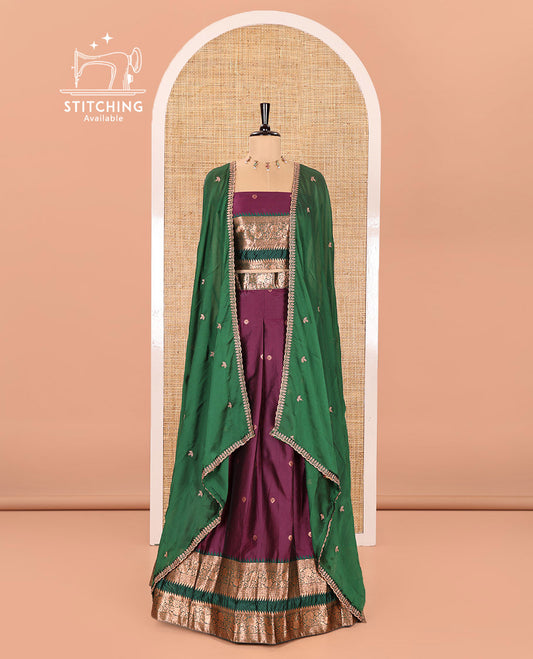 Purple-Green Semi-Banarasi Half-Saree Featuring Zari Buttas on Its Skirt, Complemented by a Contrast Traditional Zari Temple Rettai Pettu Border, Paired with a Matching Blouse, and a Satin Georgette Embroidered Scallop Dhavani