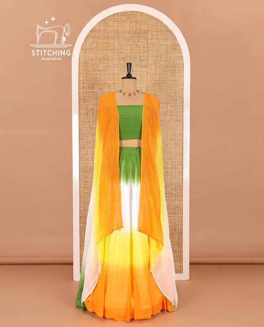 Multi-color half-saree, ombre-colored viscose georgette skirt, a plain light green blouse, and a ombre-colored zari striped dhavani