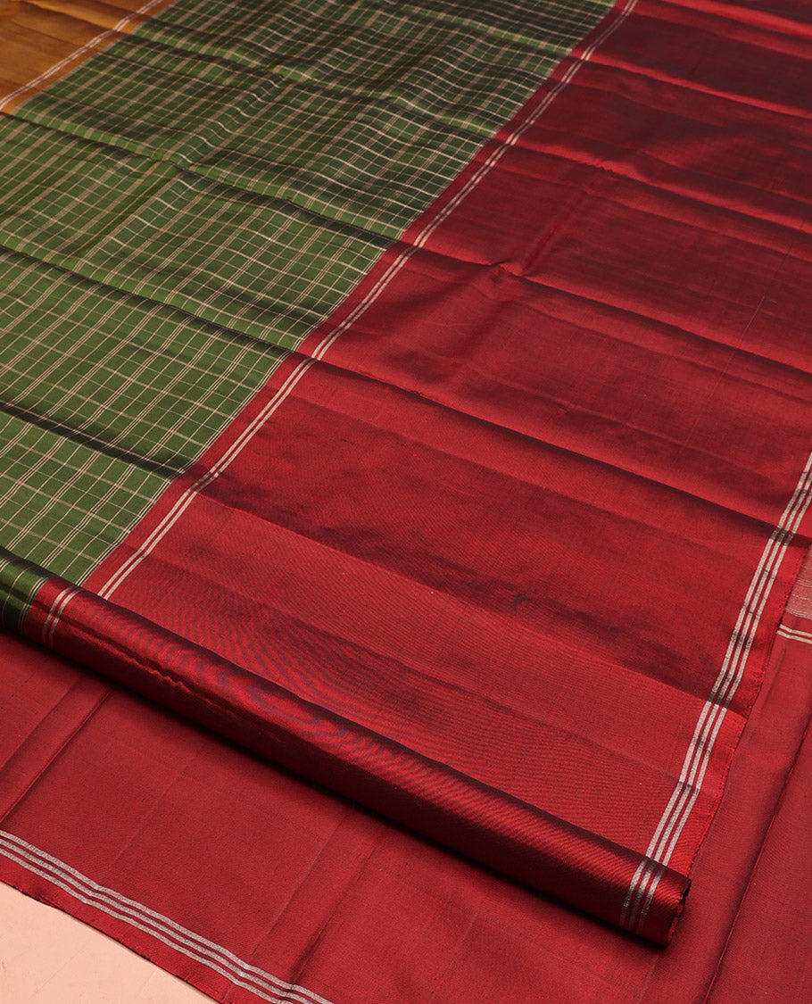 Green Kanchipuram Silk Saree, Sparsely Woven with Checked Design, Complemented by Contrast Rettai Pettu Ganga-Jamuna Border, Zari-Striped Pallu, and Contrast Blouse