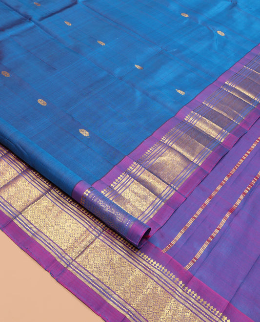 Blue Kanchipuram Silk Saree, Woven with Zari Buttas, a Contrast One-Sided Border of Panner Sombu, Banaras, Muthu, and Jaal Designs, Zari Design Pallu, and a No Blouse