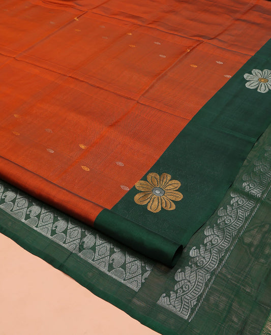 Orange Uppada Silk Saree, Woven with Zari Buttas on Its Body, Complemented by a Contrast Border of Eight-Petal Flower Motifs, Pallu of Paisley and Diamond Designs, and Paired with a Contrast Blouse