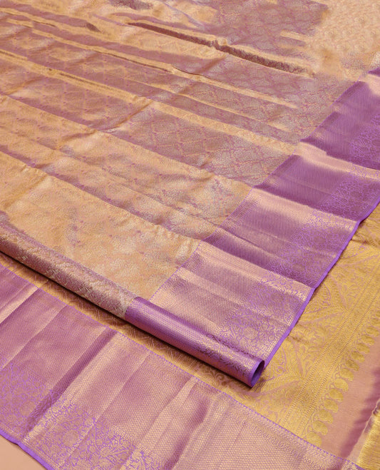 Pink Kanchipuram Silk Saree, Majestically Detailed with Zari Jacquard Design All Over Its Body, Highlighted by a Zari Border of Thilakam, Diamond, Mayil Kann, and Floral Designs, and Pallu of Jaal Designs, and Paired with a Matching Blouse