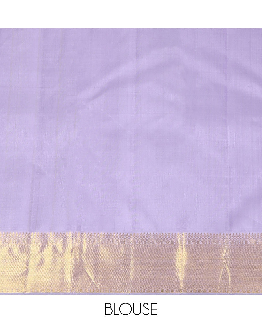 Lavender Kanchipuram Silk Saree, Ornamented with Zari Buttas All Over Its Body, Highlighted by Zari Border of Thilakam Mokku, Poun, and Kathir Designs, Gleaming Pallu, and Paired with a Matching Blouse