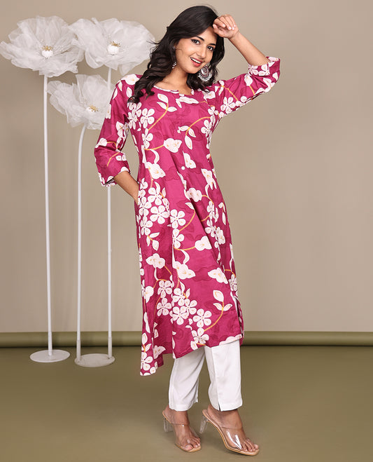 Pink Floral Printed Below-Knee-Length Cotton Kurti, Beautified with Round Neckline, 3/4 Sleeves, and A-Line Length